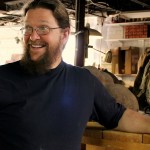 JR Butler laughing in his studio.