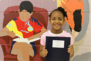 First grader Jaliyah Ray won a Distinguished Author Award for her story "The Fair Fairy."