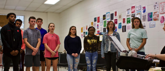 Megan Clark leads rehearsal in her classroom at Chatham Central High School. Photo by Gina Harrison.