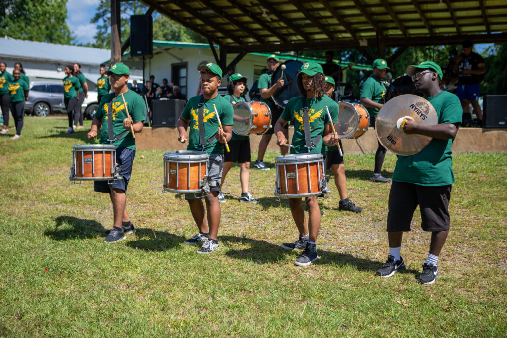 Line of boys drumming at the Juneteenth celebration in 2022