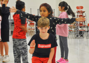 Photo featuring students trying out new dance poses