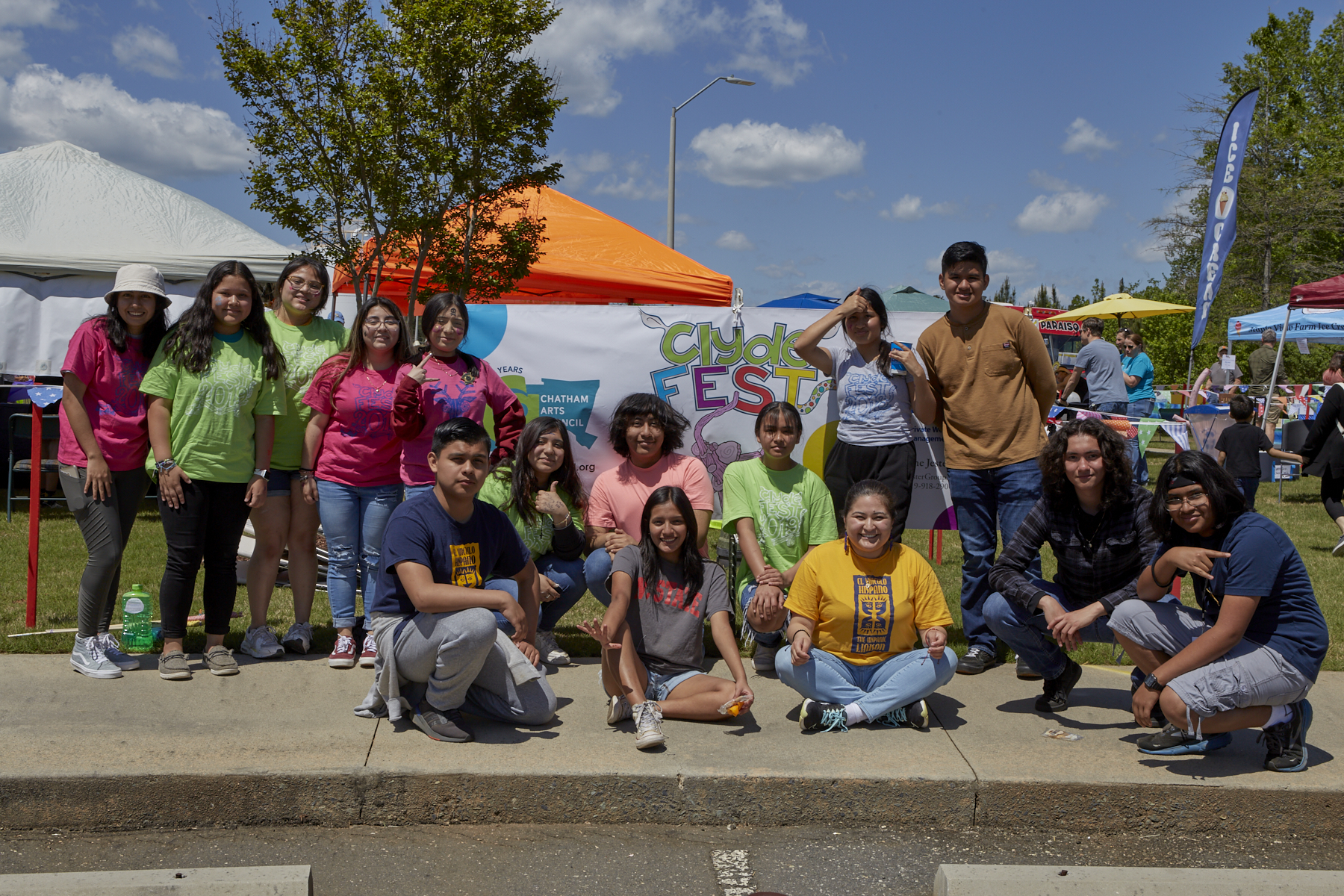 Photo of teens from Hispanic Liaison after volunteering with ClydeFEST 2023 set-up