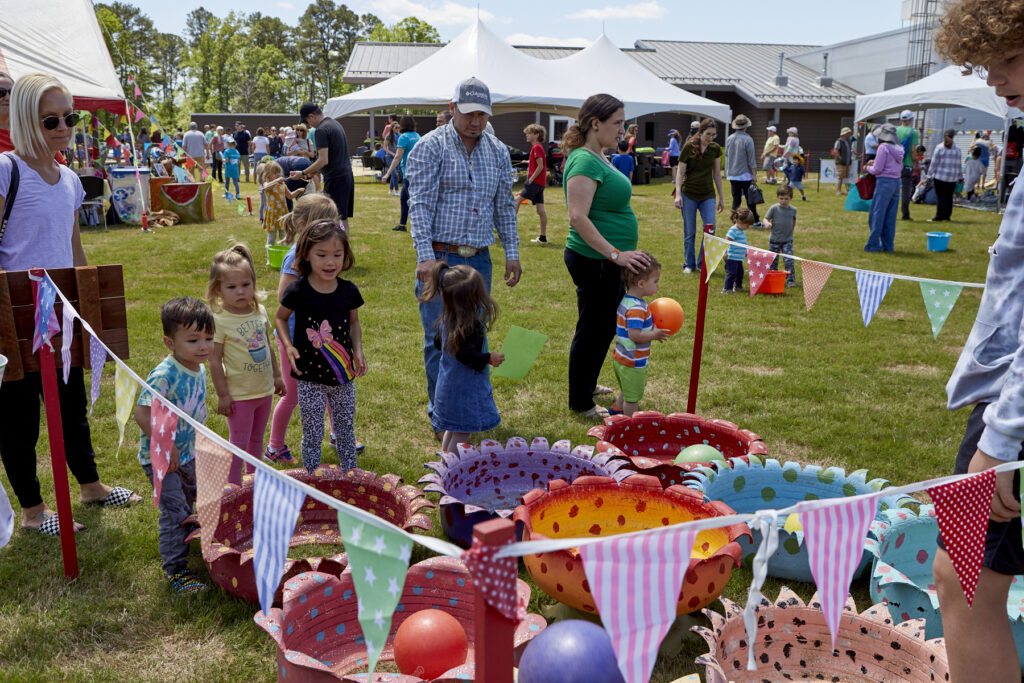 Photo of children playing old-fashioned carnival game at ClydeFEST 2023