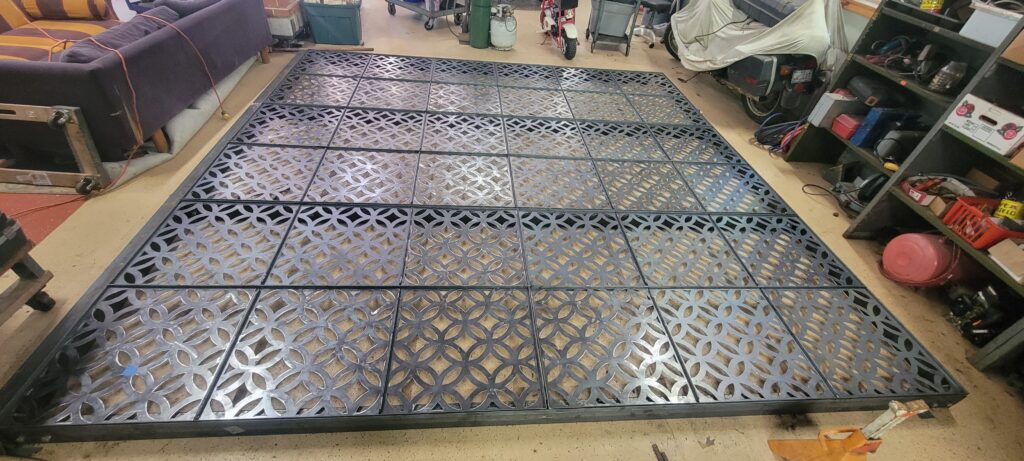 Close-up of metal lattice in progress.