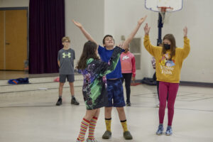 Photos of elementary students sharing their choreography