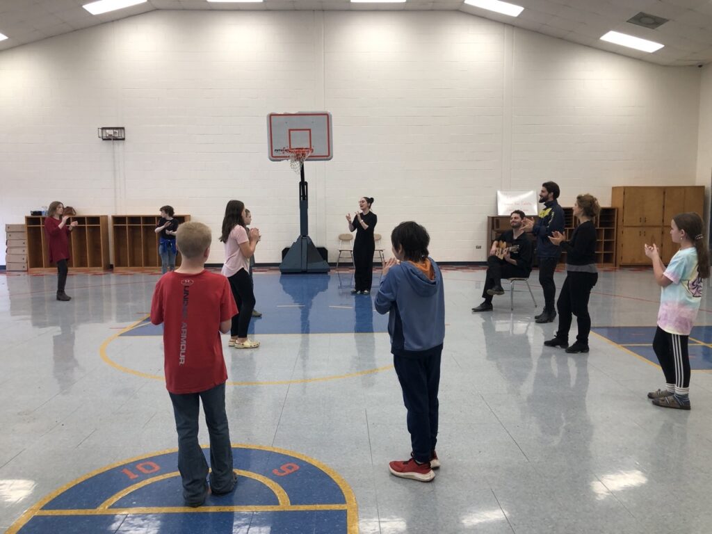 Students attend a flamenco workshop in the Bennett School gym