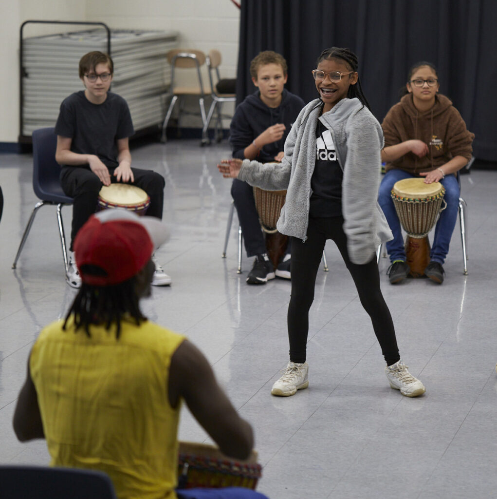 Students dance for Diali CIssokho's drum circle