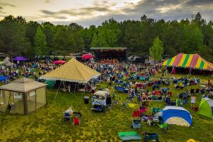 an aerial view of Shakori Hills Grassroots Festival with pavilion tents and audience