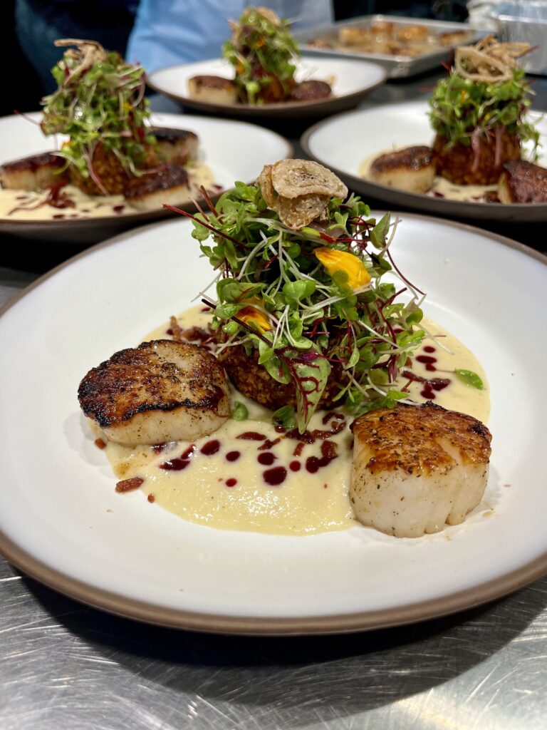four plates of scallops