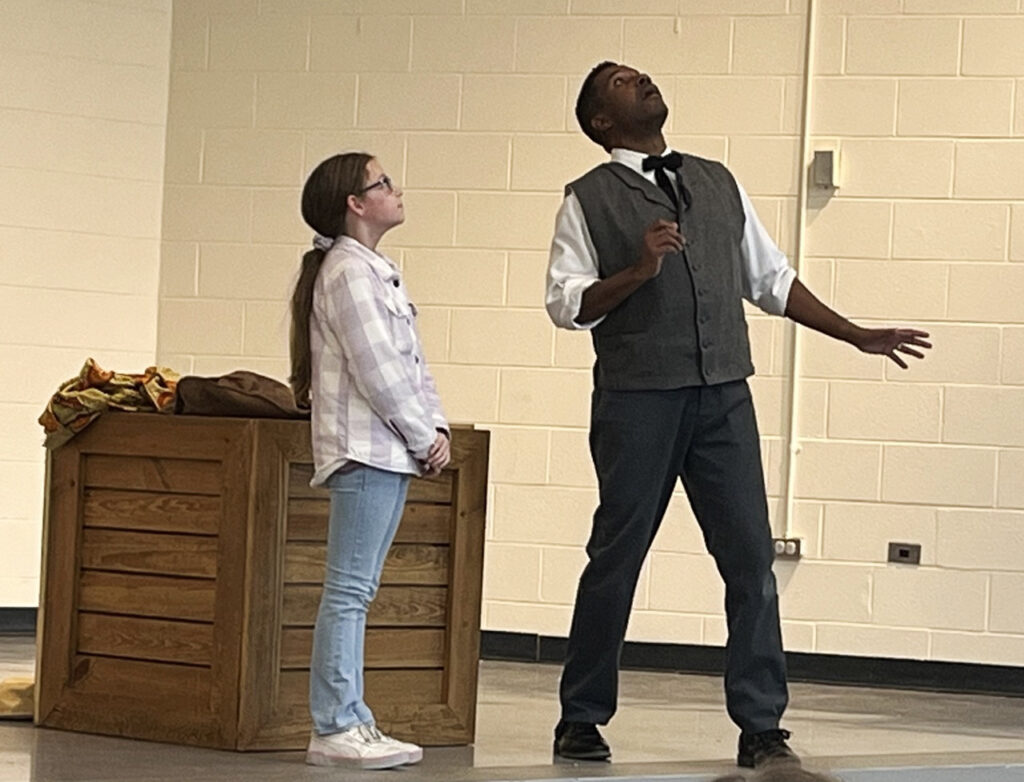 Mike Wiley acts in a one man performance for students.