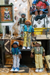 a display of brightly dressed dolls