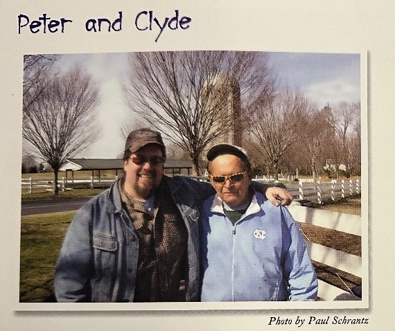 Peter Loose and Clyde Jones outside at a farm