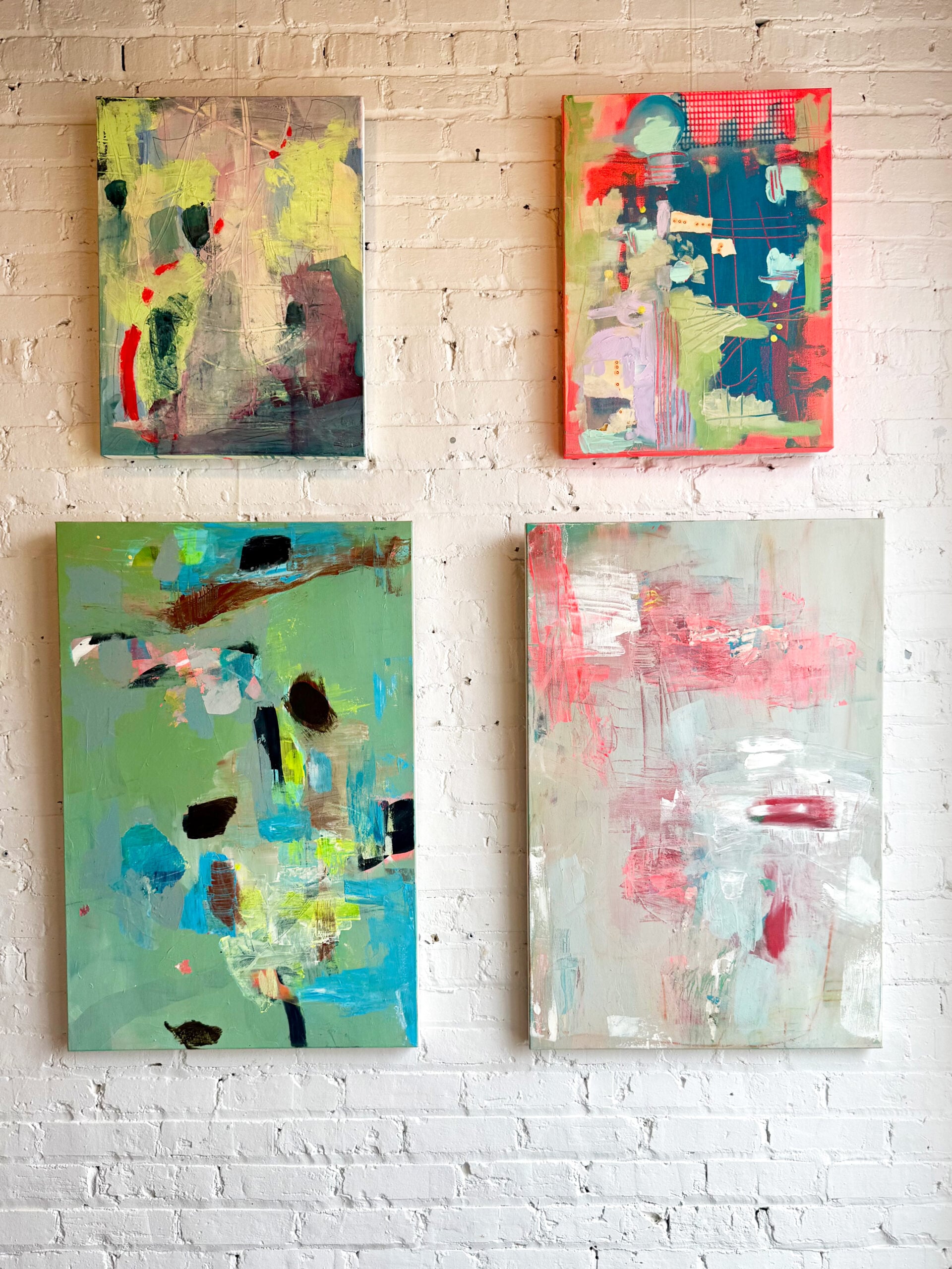 A gallery wall of mixed media collage.