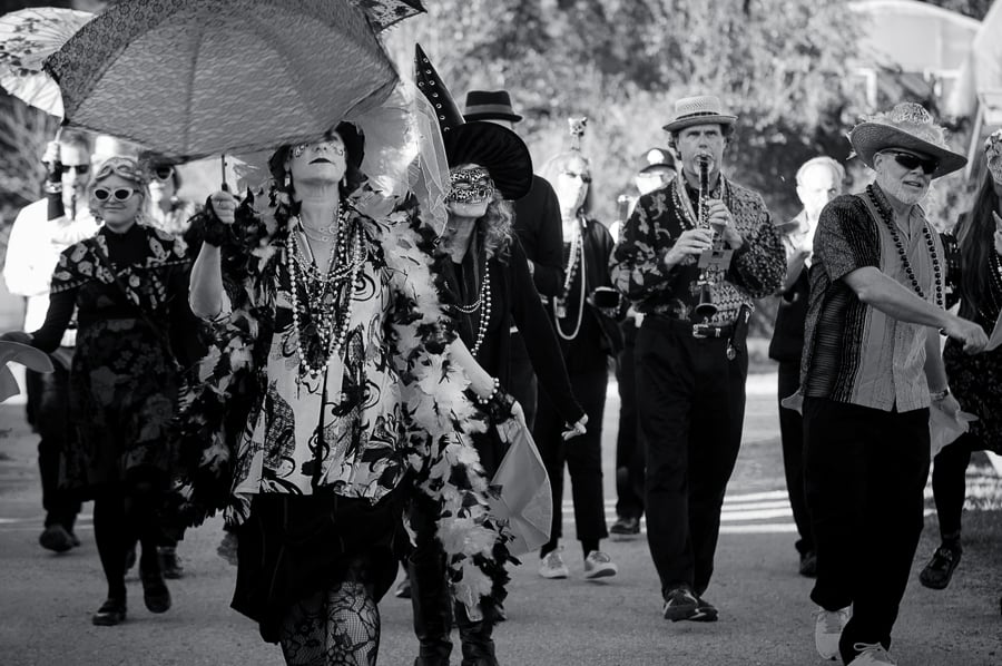 a black and white photo of a parade.